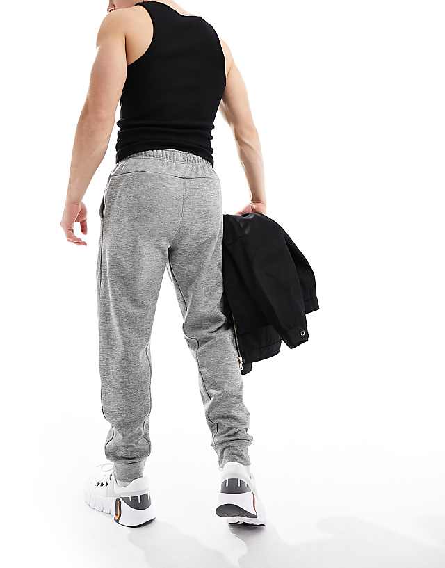 Asos Nike Training Dri-FIT Tapered Joggers In Grey