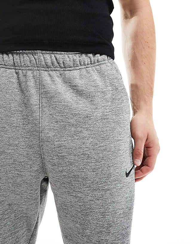 Asos Nike Training Dri-FIT Tapered Joggers In Grey