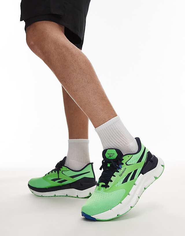 asos Reebok Zignition running trainers in green