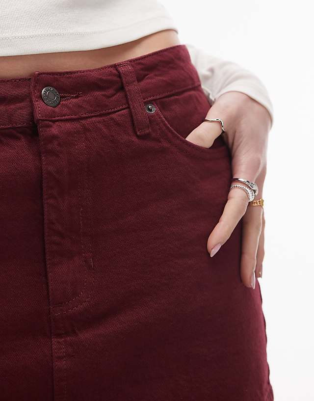 Asos Topshop Denim Mini Pelmet Skirt In Burgundy