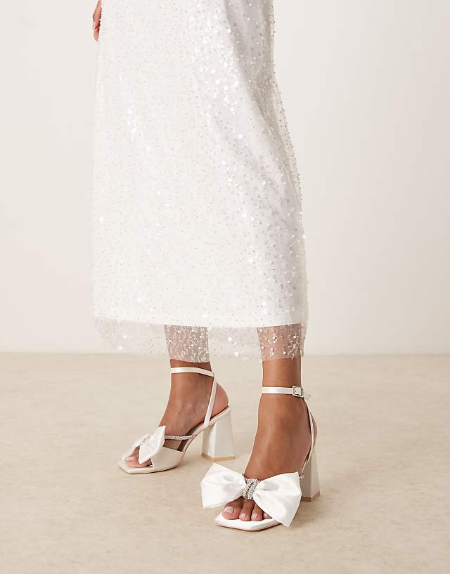 Asos Be Mine Tisca High Block Heeled Sandals With Bow In Satin Ivory