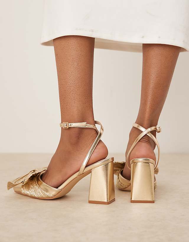 Asos Be Mine Wide Fit Sierra Heeled Pumps With Bow Detail In Satin Gold