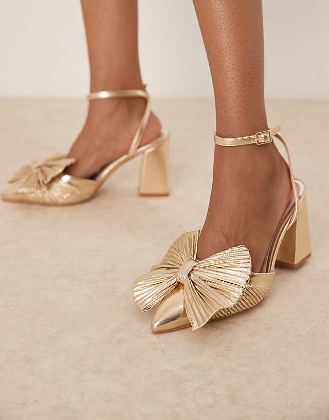 asos Be Mine wide fit Sierra heeled pumps with bow detail in satin gold