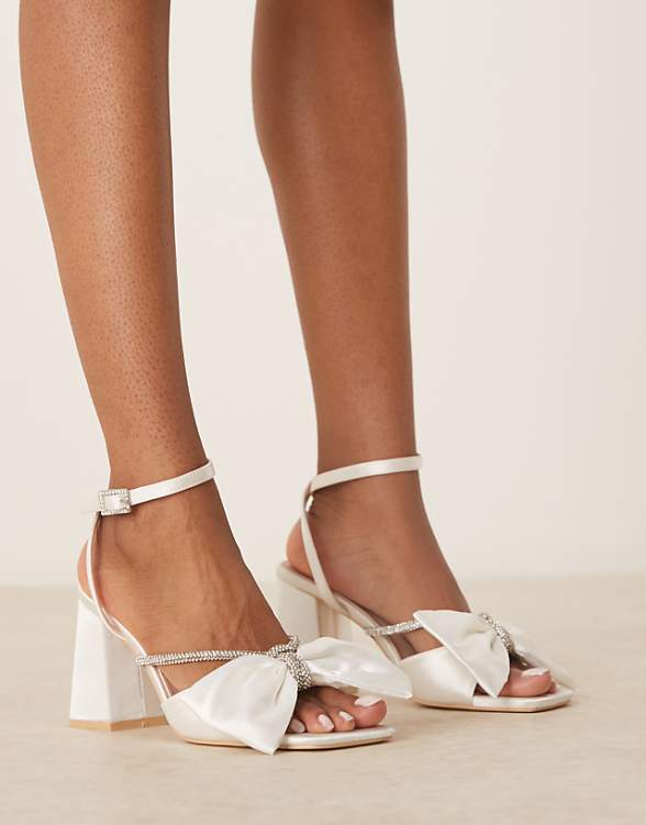 asos Be Mine wide fit Tisca high block heeled sandals with bow in satin ivory