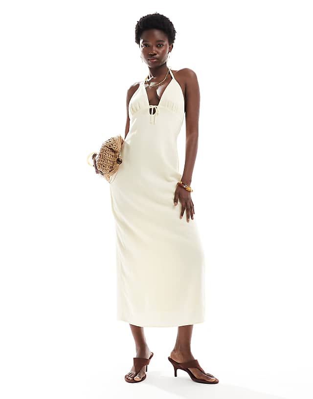 asos Bershka linen blend halter midi dress with tie detail in yellow