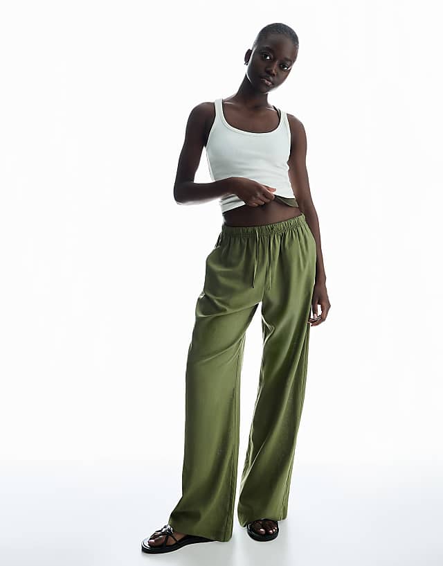asos Bershka linen blend trousers with an elasticated waistband in khaki asos Bershka linen blend trousers with an elasticated waistband in khaki
