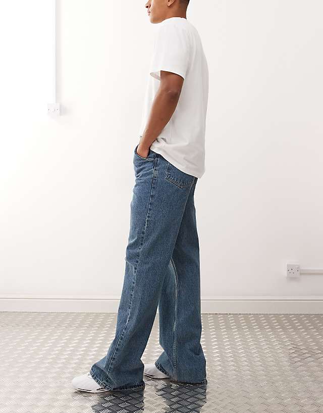 Asos COLLUSION Flare Jean In Mid Wash And Tobacco Stitching