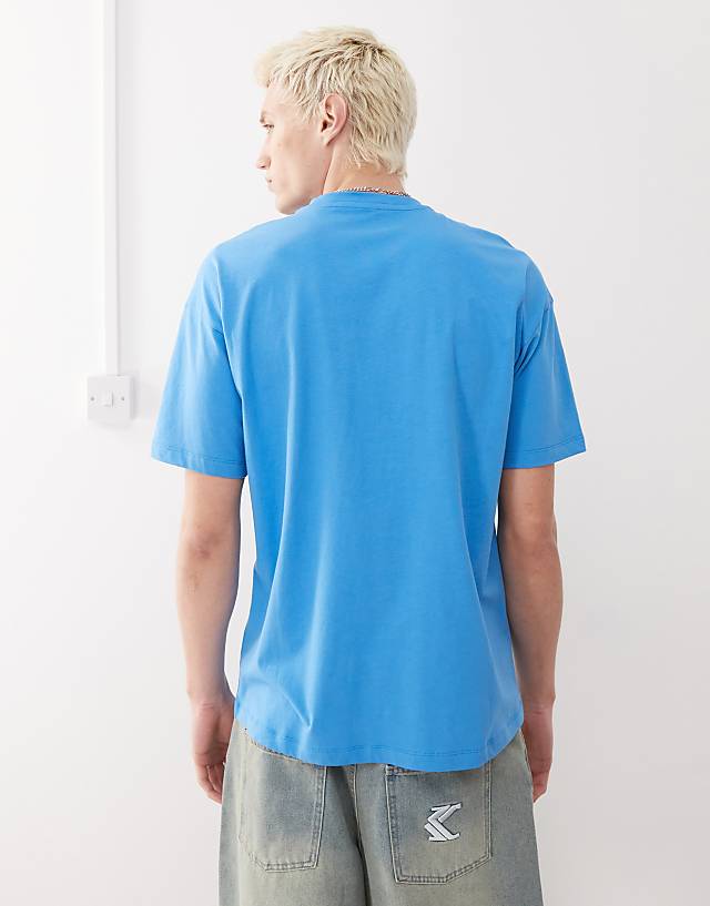 Asos COLLUSION Skater Fit Graphic T-shirt With Milk Print In Blue