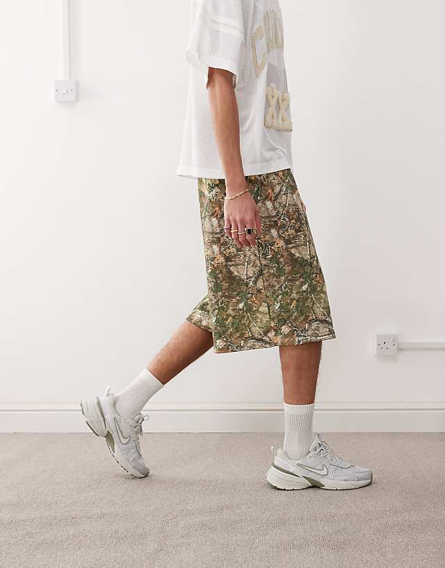Asos COLLUSION Skater Relaxed Jersey Shorts In Tree Camo Print - MULTI