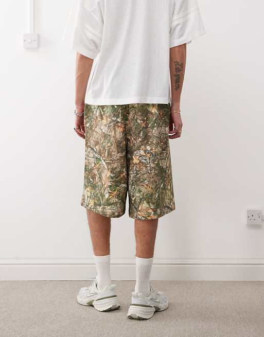 Asos COLLUSION Skater Relaxed Jersey Shorts In Tree Camo Print - MULTI