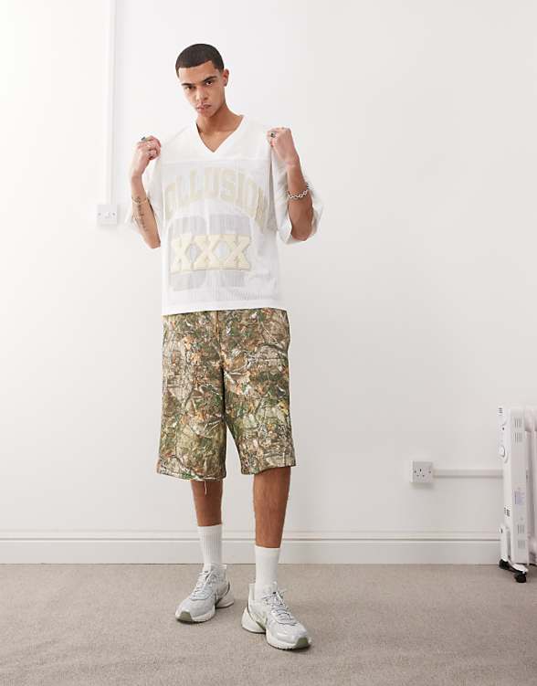 asos COLLUSION Skater relaxed jersey shorts in tree camo print - MULTI