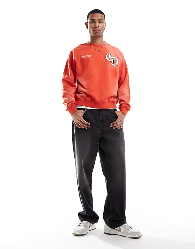 Asos Criminal Damage Spray Varsity Sweatshirt In Washed Red
