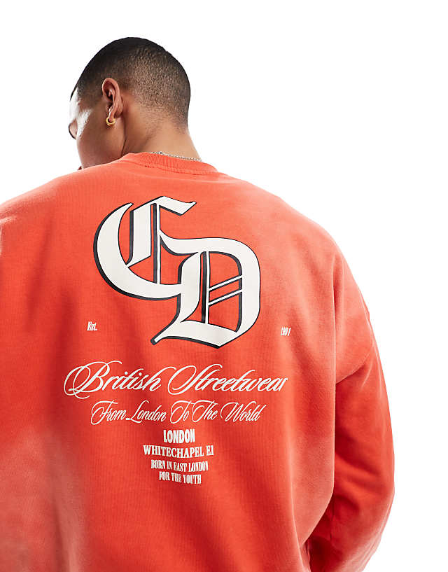 asos Criminal Damage Spray varsity sweatshirt in washed red