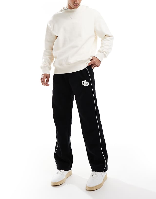 asos Criminal Damage Towelling tracksuit trouser black in black