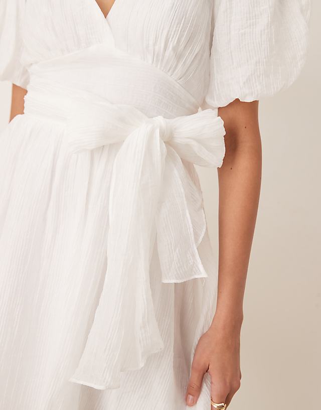 Asos Gina Tricot Short Sleeve V Neck Open Back Bow Graduation Mini Dress In Off White