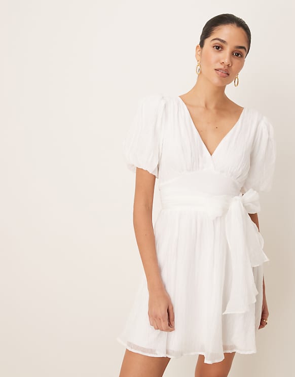 asos Gina Tricot short sleeve v neck open back bow graduation mini dress in off white