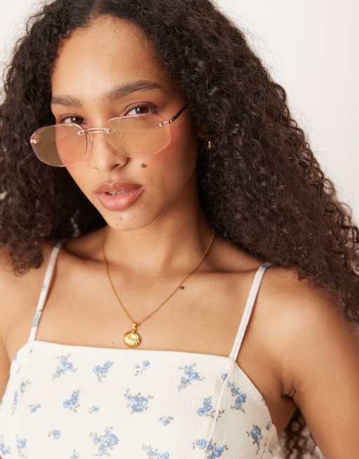 Asos Jeepers Peepers Rimless Metal Oval Sunglasses In Pink And Gold