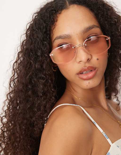 asos Jeepers Peepers rimless metal oval sunglasses in pink and gold