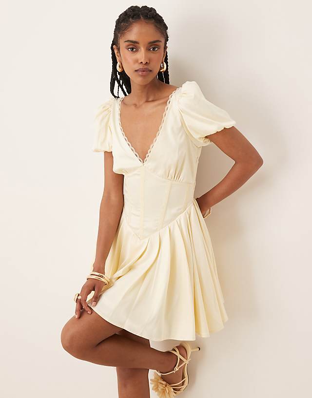 asos Lace & Beads puff sleeve satin corset mini dress in butter yellow