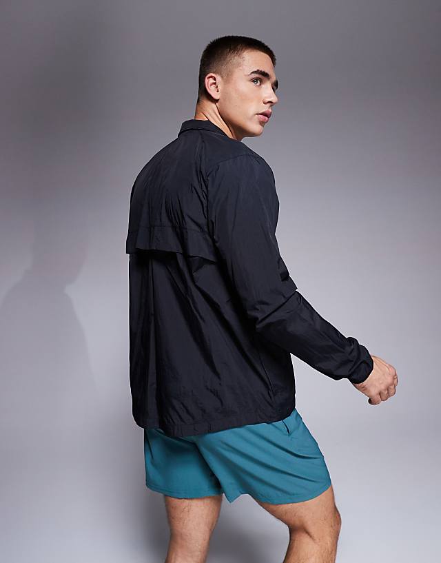 Asos New Balance Athletics Packable Jacket In Black