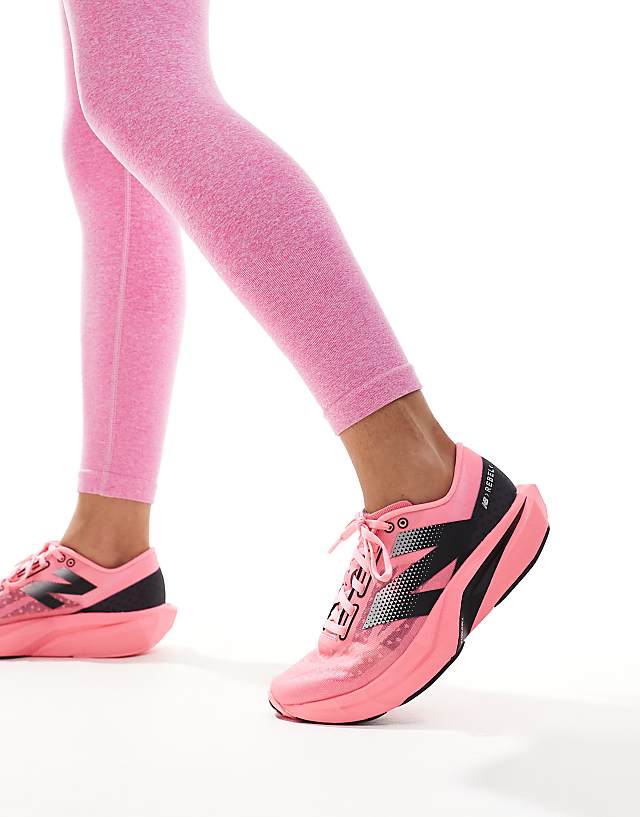 asos New Balance FuelCell Rebel running trainers in pink