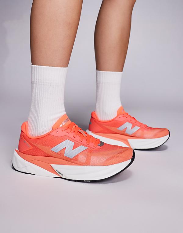 asos New Balance Fuelcell Rebel v5 running trainers in bright red