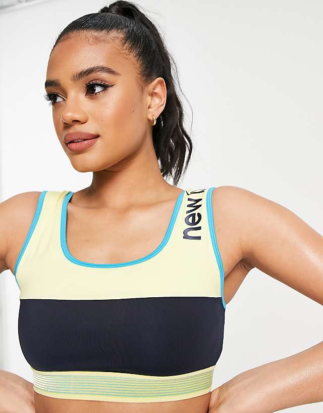 asos New Balance Running Achiever retro remix light support long line sports bra in yellow