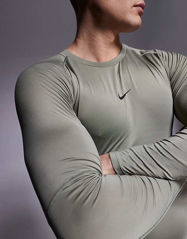 Asos Nike Pro Training Dri-FIT Muscle Fit Long Sleeve Top In Khaki