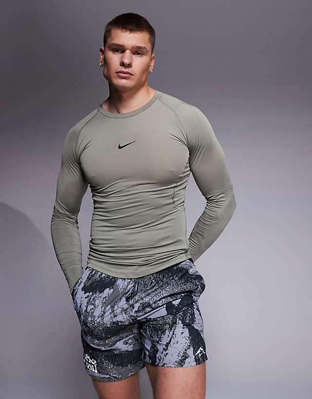 asos Nike Pro Training Dri-FIT muscle fit long sleeve top in khaki