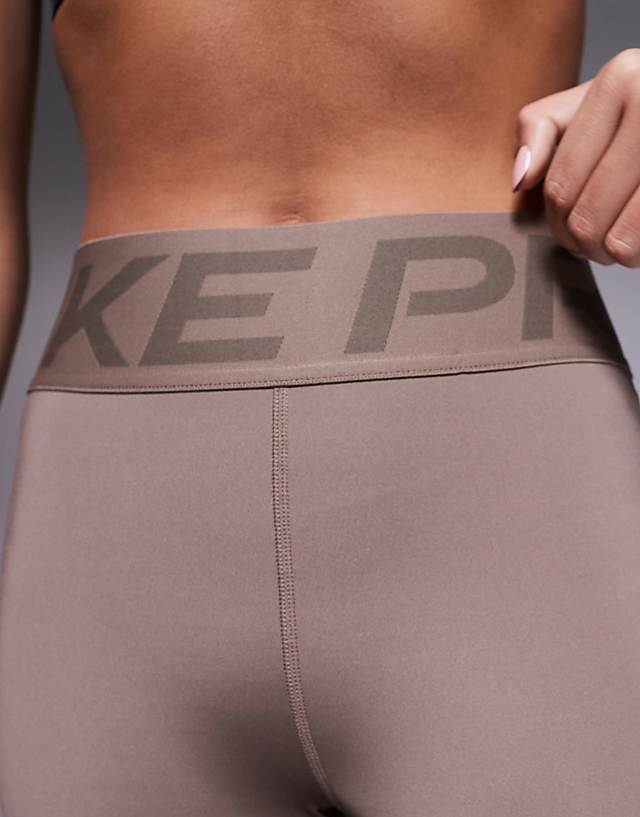 Asos Nike Pro Training Dri-FIT Sculpt High Waisted Leggings In Brown