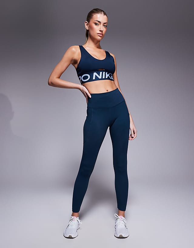 Asos Nike Pro Training Indy Dri-FIT Plunge Light Support Sports Bra In Navy