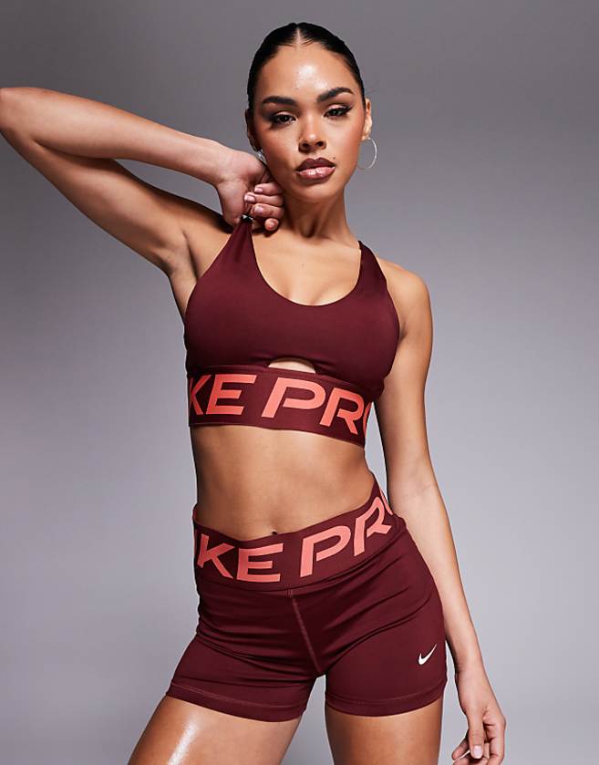 asos Nike Pro Training Indy Dri-FIT Plunge light support sports bra in burgundy