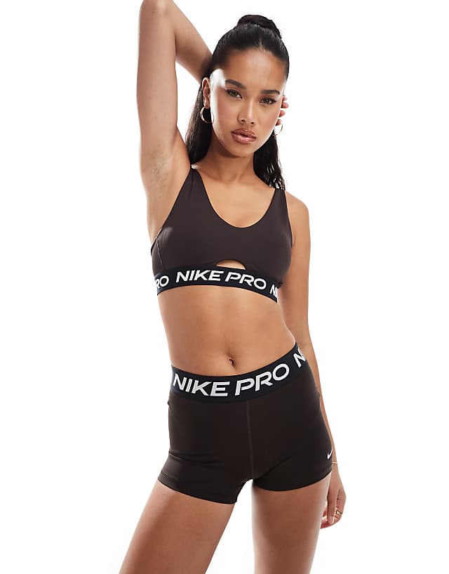 asos Nike Pro Training Indy medium support plunge sports bra in brown