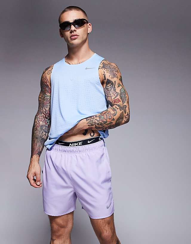 asos Nike Running Challenger Dri-FIT 5 inch shorts in lilac