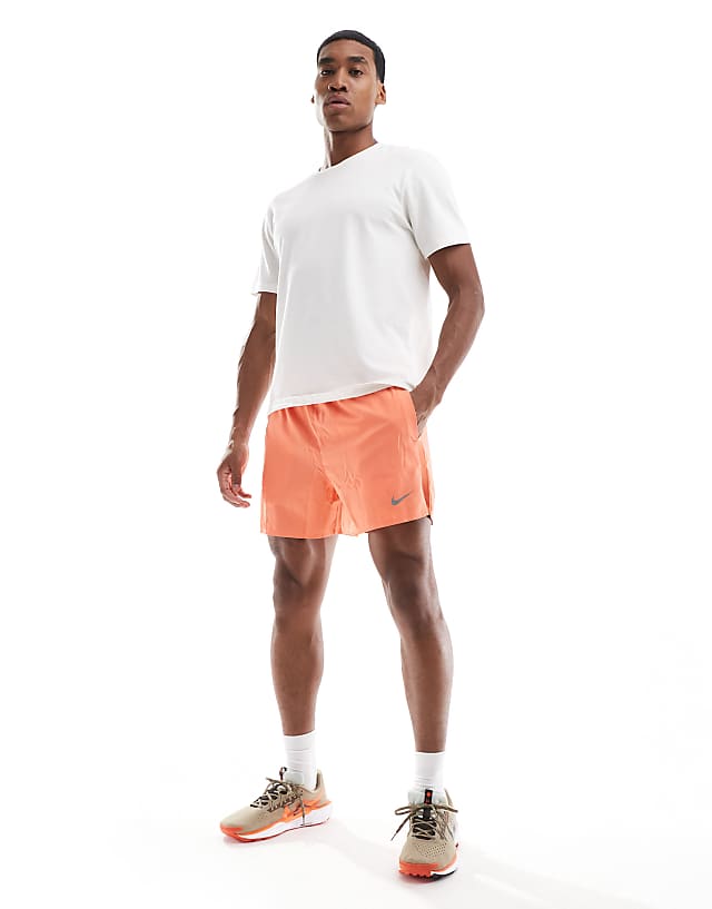 Asos Nike Running Challenger Dri-FIT 5 Inch Shorts In Orange