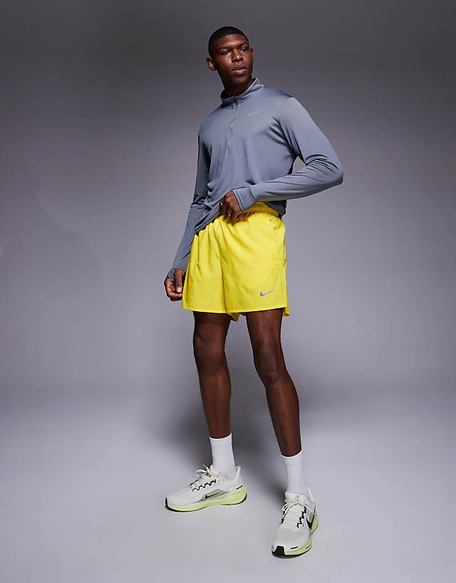 Asos Nike Running Challenger Dri-FIT 5 Inch Shorts In Yellow