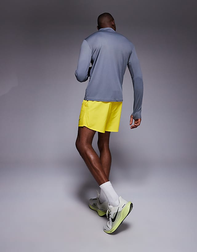 Asos Nike Running Challenger Dri-FIT 5 Inch Shorts In Yellow