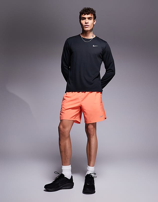Asos Nike Running Challenger Dri-FIT 7 Inch Shorts In Orange