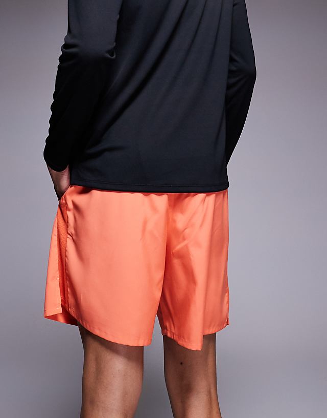 Asos Nike Running Challenger Dri-FIT 7 Inch Shorts In Orange