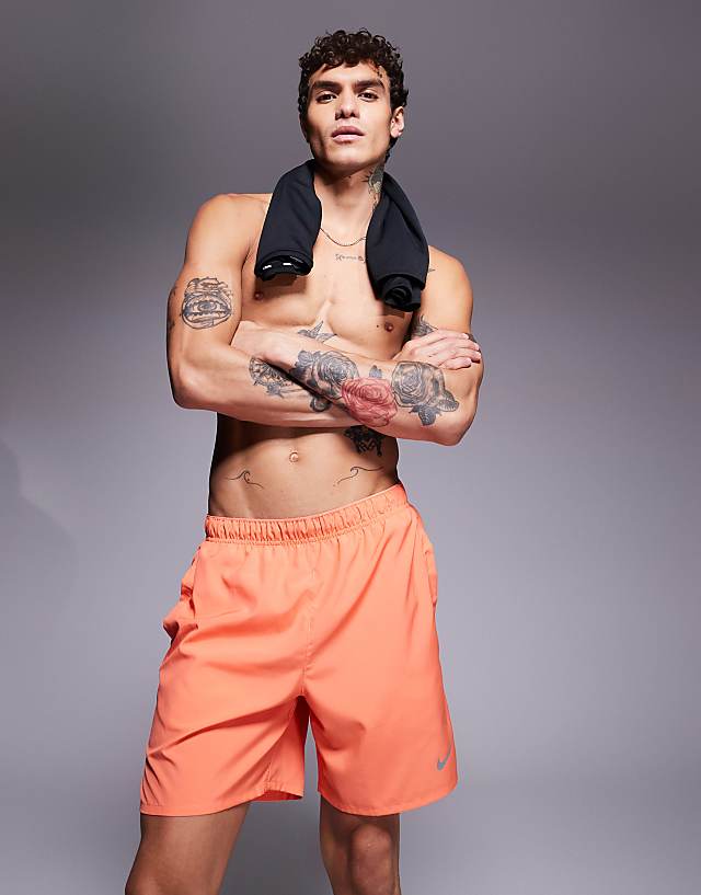 asos Nike Running Challenger Dri-FIT 7 inch shorts in orange