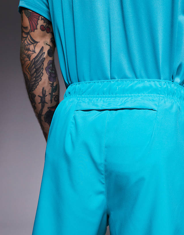 Asos Nike Running Challenger Dri-FIT 7 Inch Shorts In Turquoise