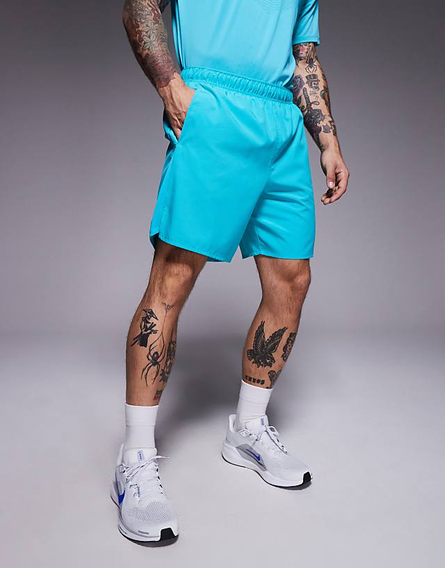 asos Nike Running Challenger Dri-FIT 7 inch shorts in turquoise