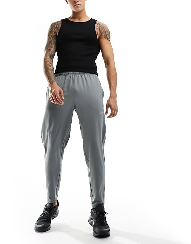 Asos Nike Running Challenger Dri-FIT Joggers In Grey