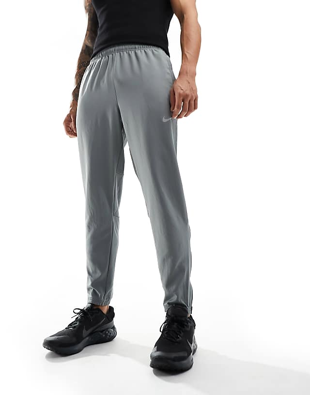 asos Nike Running Challenger Dri-FIT joggers in grey