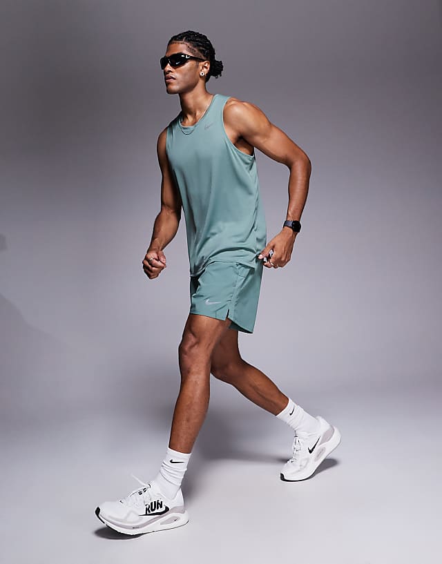 asos Nike Running Dri-FIT Challenger 5 inch shorts in green