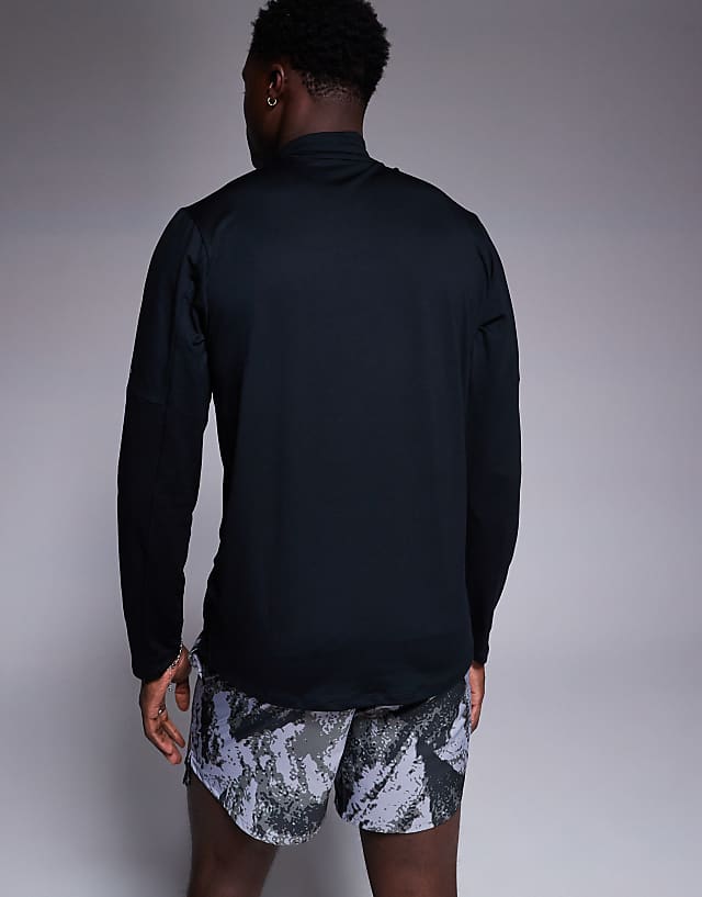 Asos Nike Running DRI-FIT Element Zip Long Sleeve Top In Black