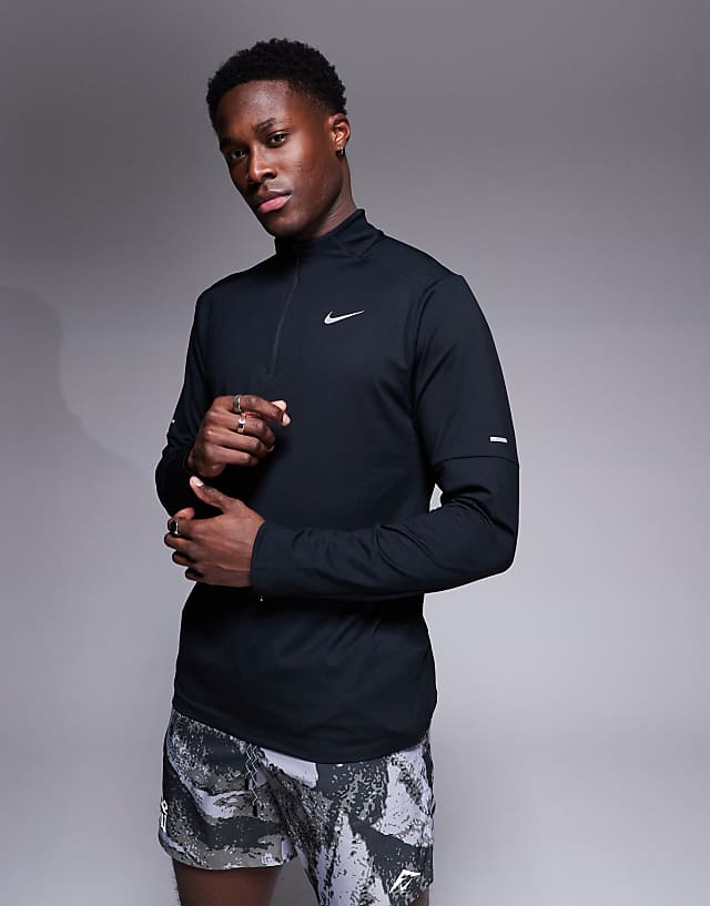 asos Nike Running DRI-FIT Element zip long sleeve top in black