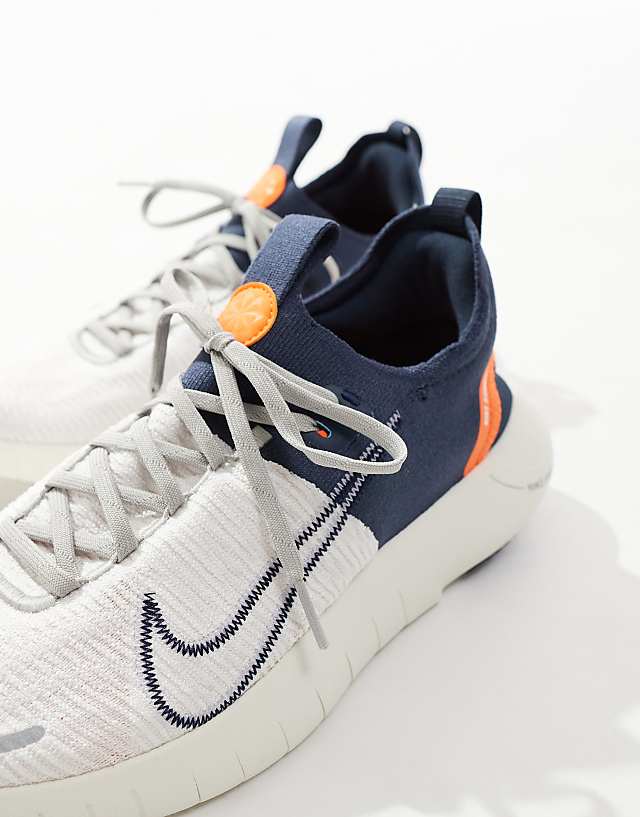 Asos Nike Running Free Run Flyknit NN Trainers In Grey And Orange