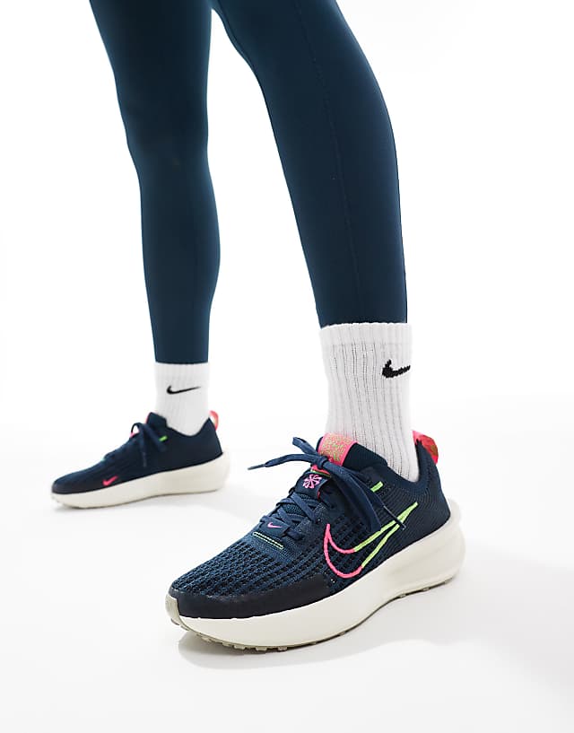 asos Nike Running Interact Run trainers in navy and white