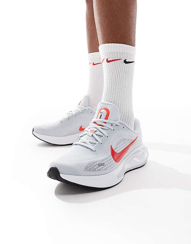 asos Nike Running Journey Run trainers in grey and red